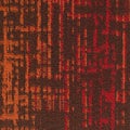 Tufted carpet texture with abstract red and orange pattern Royalty Free Stock Photo