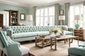 A tufted linen sofa in a coastal-inspired living room with seafoam accents