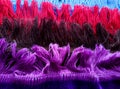 Tassel on the edge of the rug with soft purple, brown, red cotton threads Royalty Free Stock Photo