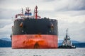 Bulk Carrier with Tug Assist Royalty Free Stock Photo