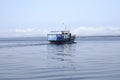 The Tug boat floats on the river Royalty Free Stock Photo