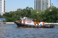 A tug boat goes up the river Royalty Free Stock Photo