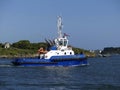 Tug boat in operations Royalty Free Stock Photo