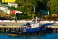 Tug boat tied up at dock in St Maarten Royalty Free Stock Photo