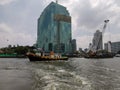 Tug boat tows large barge