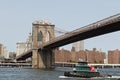 Tug boat under Brooklyn Bridge Royalty Free Stock Photo