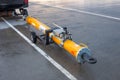 TUG carrier for an airplane, for hitching landing gear pushback aerodrome