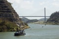 Tug of a Cruise ship passing Panama Canal near the bridge. Royalty Free Stock Photo