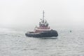 Tug Eric McAllister approaching New Bedford in fog Royalty Free Stock Photo