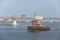 Tug Iona McAlister passing lighthouse on Acushnet River Royalty Free Stock Photo