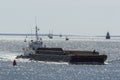Tug Thuban pushing barge toward New Bedford in stiff wind