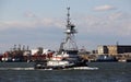 Tugboat ANDREA passing Kill Van Kull strait eastward on background of Bayonne, NJ