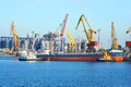 Tugboat assisting bulk cargo ship Royalty Free Stock Photo