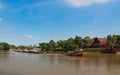 Tugboat and barge carry sand along the Chaophraya river