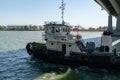 Tugboat Captain Kravtsov goes on Don river under Voroshilovsky bridge