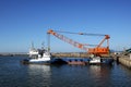 Tugboat and crane Royalty Free Stock Photo