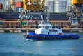 Tugboat and port cargo crane Royalty Free Stock Photo