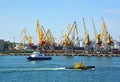 Tugboat and port cargo crane Royalty Free Stock Photo