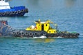 Tugboat in harbor quayside Royalty Free Stock Photo