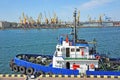 Tugboat in harbor quayside Royalty Free Stock Photo