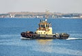 Tugboat in harbor quayside Royalty Free Stock Photo