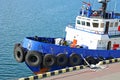 Tugboat in harbor quayside Royalty Free Stock Photo