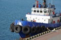 Tugboat in harbor quayside Royalty Free Stock Photo