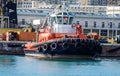 Tugboat moored in the port of Genoa, Italy