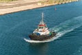 Tugboat passing through the Suez Canal in Egypt, Africa