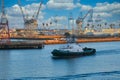 Tugboat Past Shipping Harbor