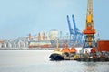 Tugboat and port cargo crane Royalty Free Stock Photo