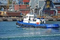 Tugboat and port cargo crane Royalty Free Stock Photo