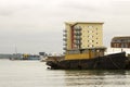 A tugboat in the process of being converted to a pleasure craft tied up at the quayside in Hythe harbour on Southampton Water