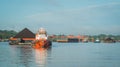 Tugboat pull heavy loaded barge of coal Royalty Free Stock Photo