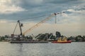 Tugboat pulls floating platform with crane, San Diego, USA