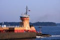 Tugboat pushing barge