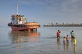 Tugboat ran aground, the sailors went ashore, Bandar Abbas, Iran