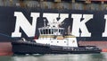 Tugboat ROBERT FRANCO off the port side of NYK APHRODITE