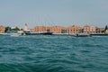 Tugboat sails off the coast of Venice