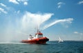 Tugboat squirts water in Istanbul, Turkey Royalty Free Stock Photo