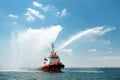 Tugboat squirts water in Istanbul, Turkey Royalty Free Stock Photo