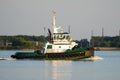 A Tugboat on the Water in Motion