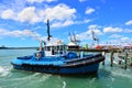 Tugboat works at Captain Cook Wharf in Ports of Auckland