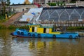 Tugboat works on musical fountain outside parliament building on Sarawak River Kuching Malaysia