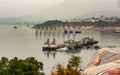 Tugboats and office pontons on Yangze at Three Gorges Dam, China