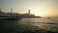 Tugs escort a passenger ship through Victoria Harbor in Hong Kong