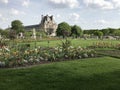 The Tuileries Garden in the center of Paris with MusÃÂ©e du Louvre on the background Royalty Free Stock Photo