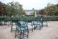 The Tuileries, Paris in fall: Serene green chairs await visitors on cultural trip. Travel concept