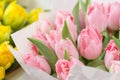 Tuips closeup. Flower shop concept. Mixed color. Fresh spring flowers in refrigerator room for flowers. Bouquets on Royalty Free Stock Photo