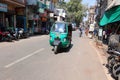 Tuk Tuk drivers, cyclists and pedestrians move on the busy crowded street Royalty Free Stock Photo